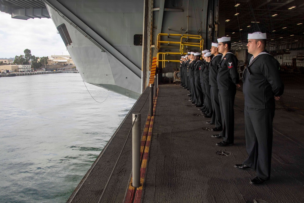 USS Carl Vinson (CVN 70) Sailors Man the Rails while departing San Diego