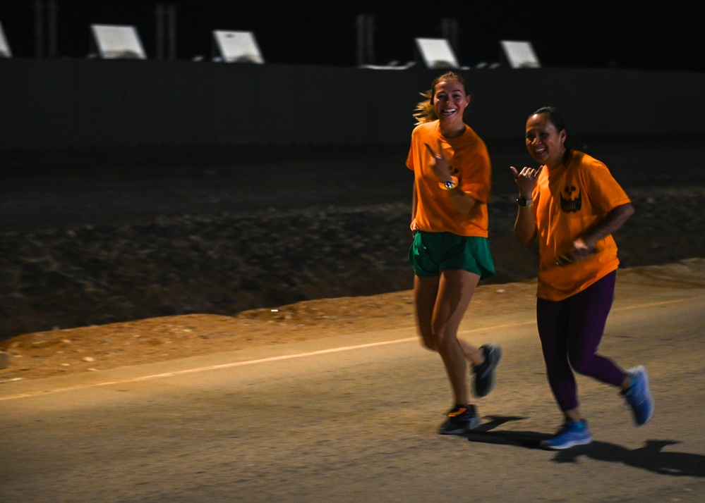 Airmen participate in haunted 5K race