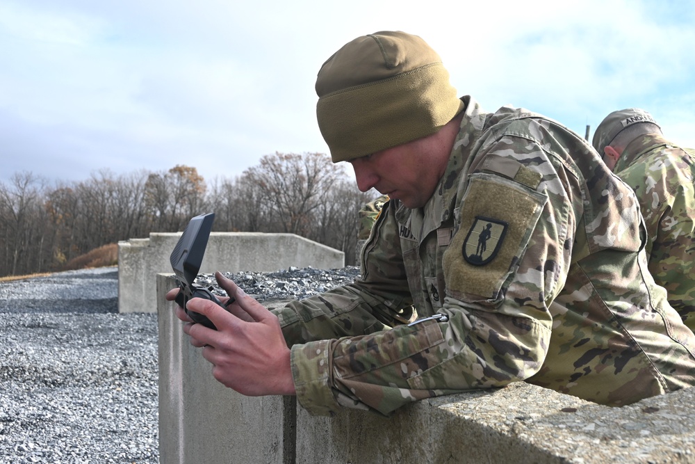 166th Regiment – RTI instructors use drones to call for artillery fire