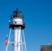 Coast Guard Member Engages with Students on Coney Island Lighthouse History