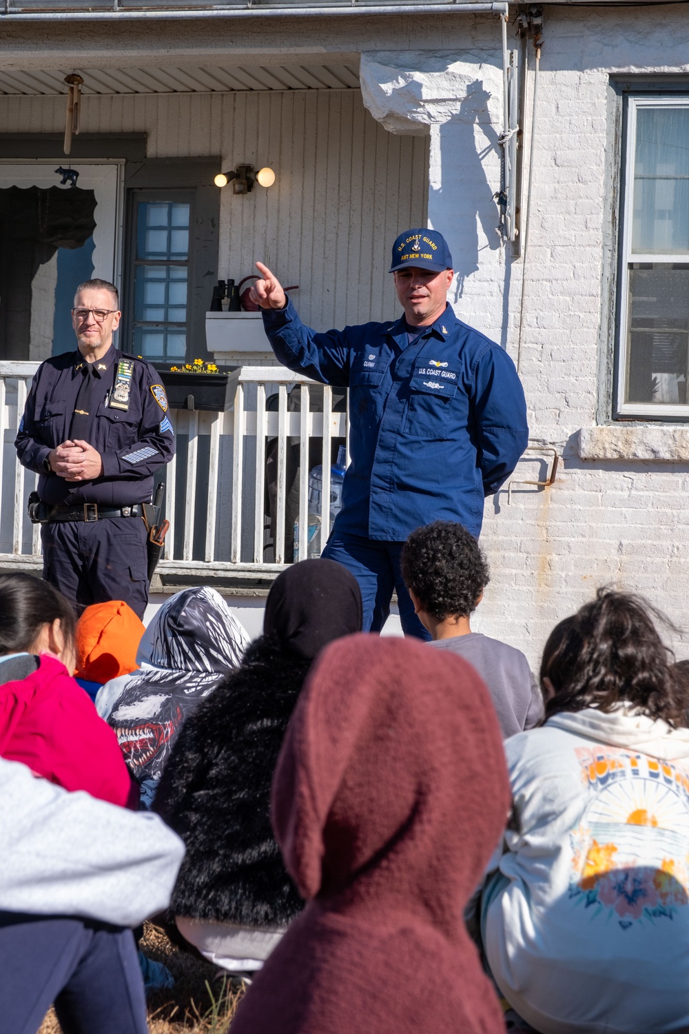 Coast Guard Member Engages with Students on Coney Island Lighthouse History