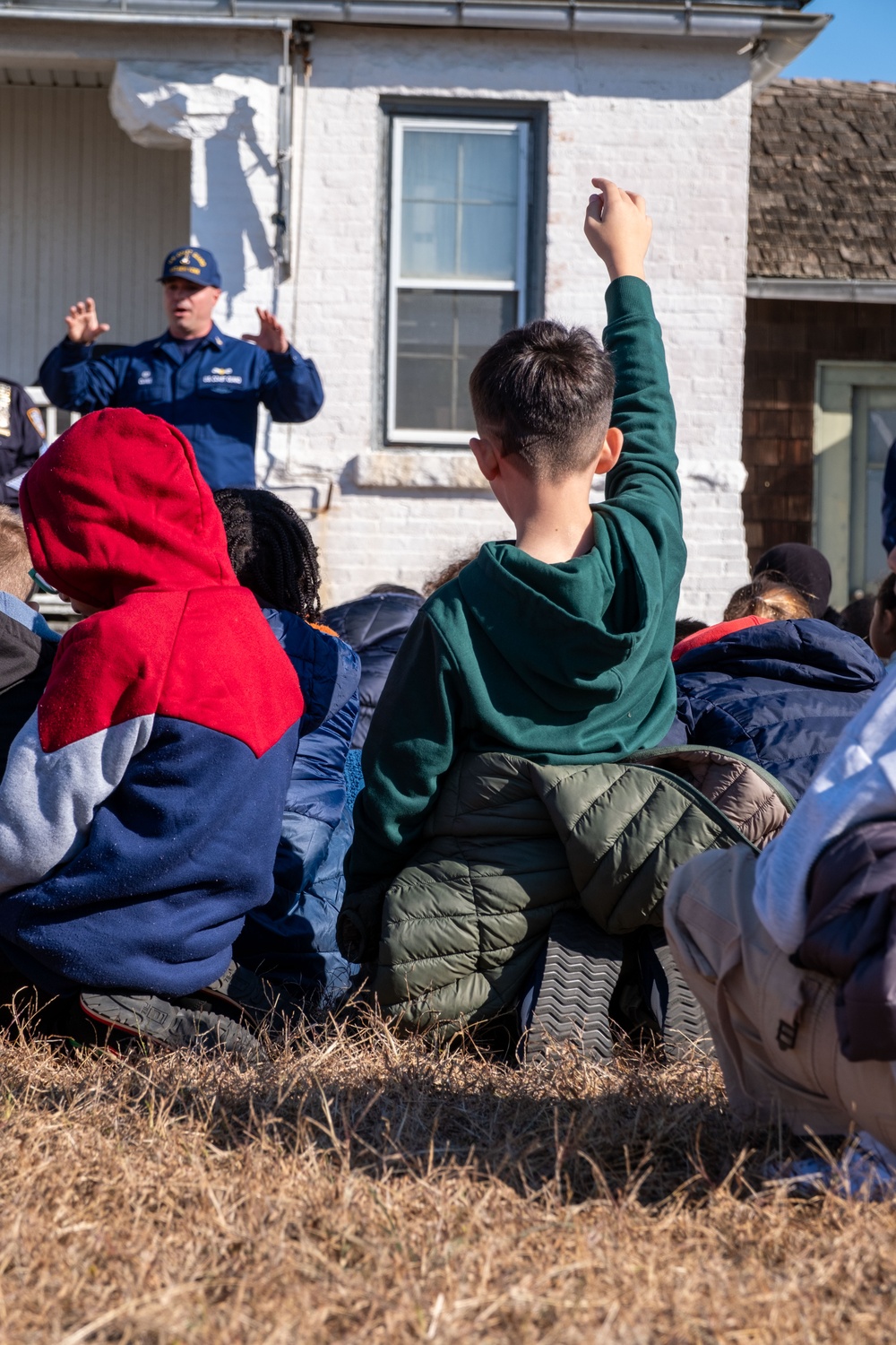 Coast Guard Member Engages with Students on Coney Island Lighthouse History