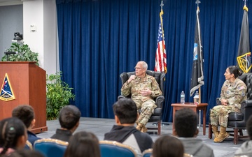 Lt. Gen. Philip Garrant and Chief Master Sgt. Jacqueline Sauvé participate in a Q&amp;A session with students from Ramona Elementary School