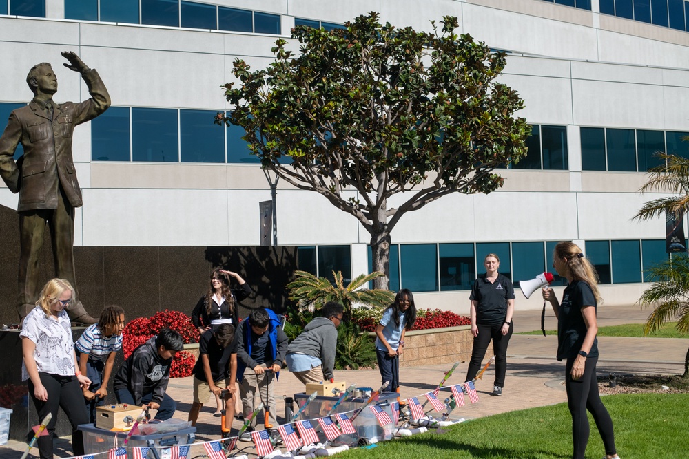 Students prepare to sendoff their paper rockets