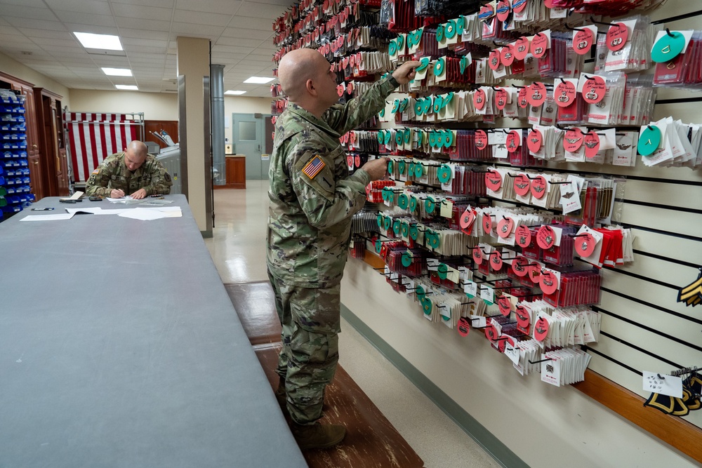 United States Army liaison case managers prepare uniform