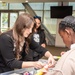 Nicole Palmer, director of Space Systems Command STEM Program, participates in STEM activities with Ramona Elementary students