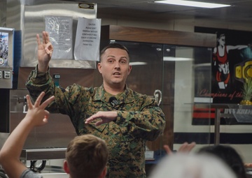 15th MEU Mobility Officer Performs Magic Show During USS Boxer Tiger Cruise