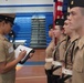 NWS Yorktown Sailors volunteer at York High School during annual NJROTC event