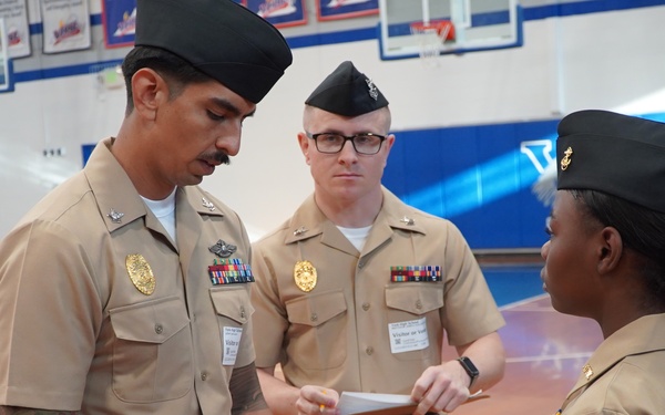 NWS Yorktown Sailors volunteer at York High School during annual NJROTC event