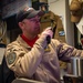 A USS Carl Vinson (CVN 70) Officer Coordinates an Ordnance Evolution