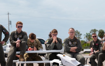 927th ARW Airmen view robotic dog demonstration