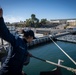 Nimitz Sailor Directs Capstan Operator