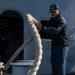 Nimitz Sailor Heaves Around Line