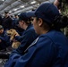 Nimitz Sailors Pet a Dog