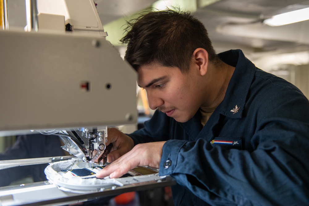 USS Ronald Reagan (CVN 76) Sailors perform daily operations