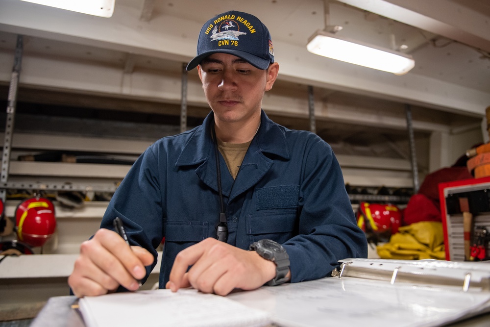 USS Ronald Reagan (CVN 76) Sailors perform daily operations