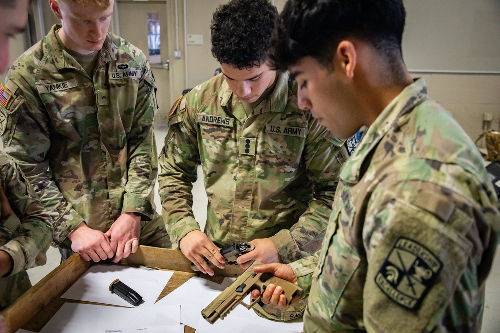 Army South leaders provide weapons familiarization to cadets before Ranger Challenge