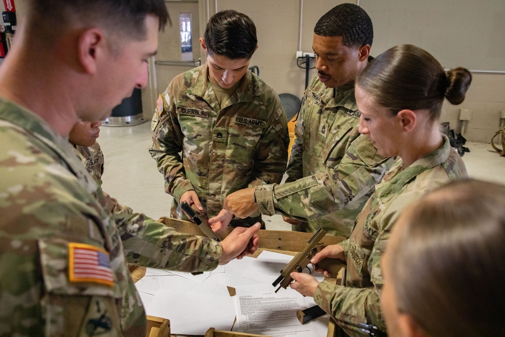 Army South leaders provide weapons familiarization to cadets before Ranger Challenge