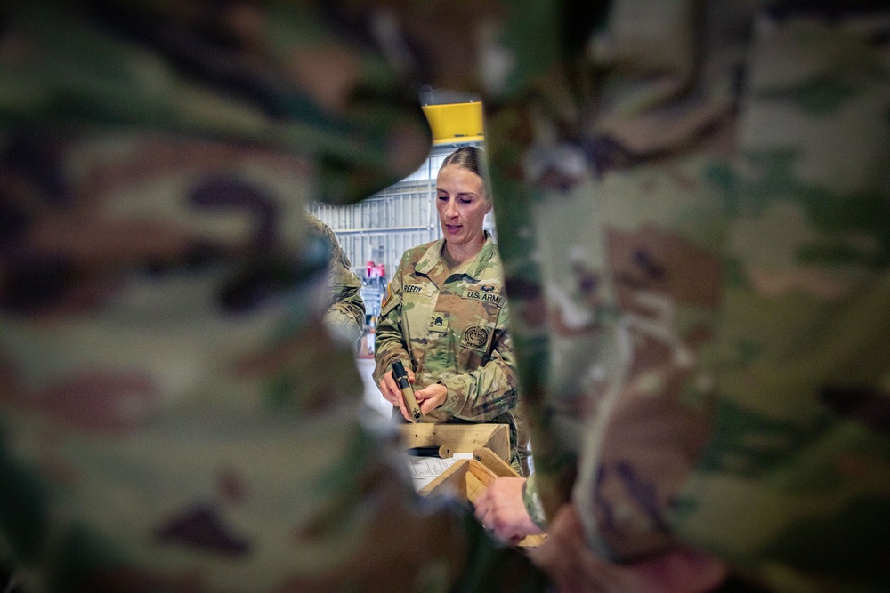 Army South leaders provide weapons familiarization to cadets before Ranger Challenge