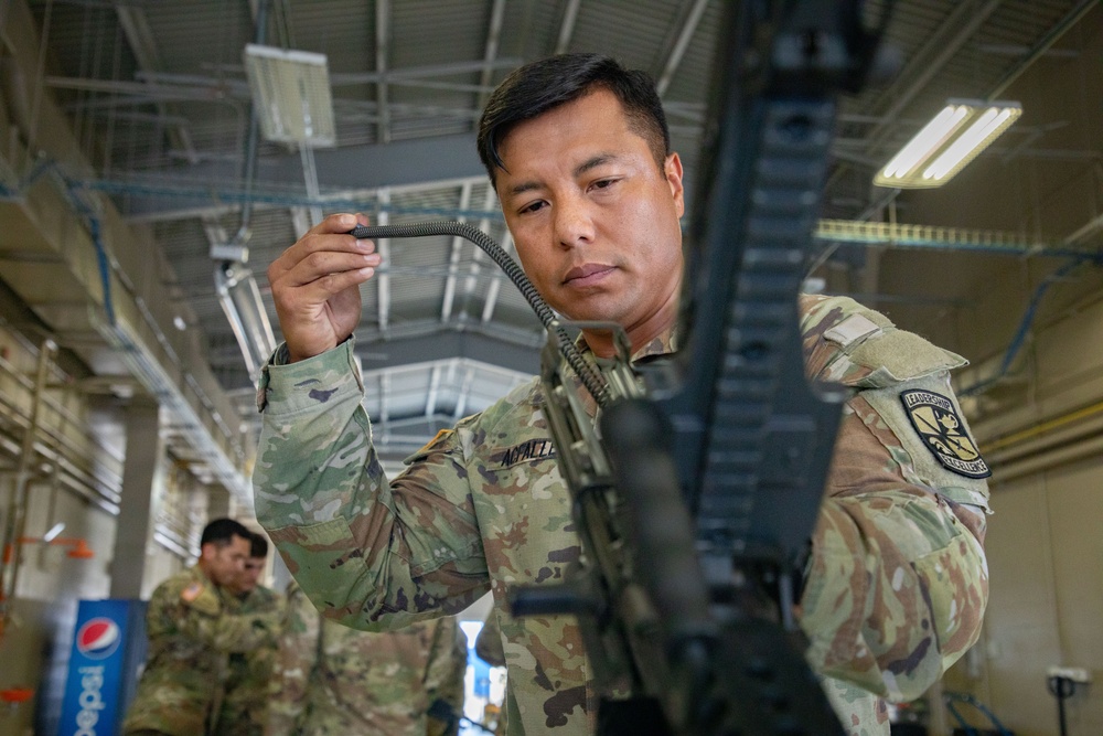 Army South leaders provide weapons familiarization to cadets before Ranger Challenge