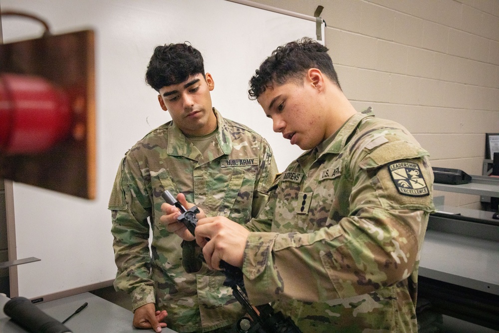 Army South leaders provide weapons familiarization to cadets before Ranger Challenge