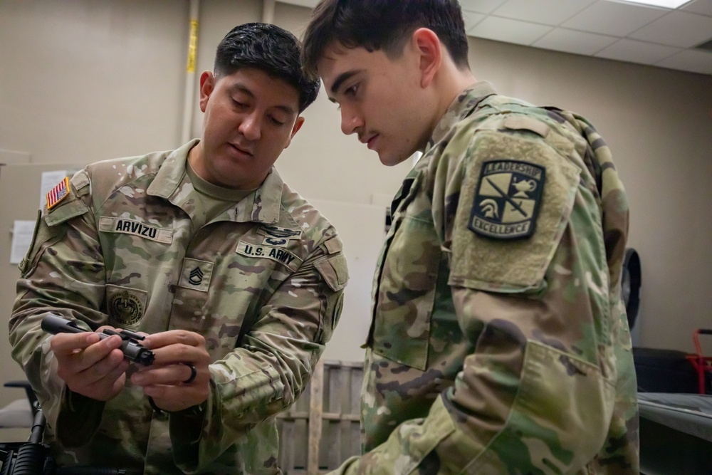 Army South leaders provide weapons familiarization to cadets before Ranger Challenge