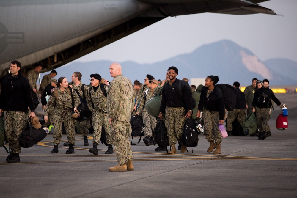 U.S. Navy Sailors return to Marine Corps Air Station Iwakuni, Japan