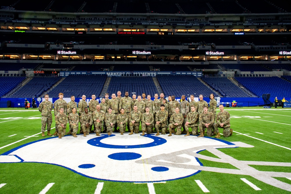 Indiana National Guard soldiers, airmen participate in pregame ceremonies at the Indianapolis Colts, Detroit Lions game