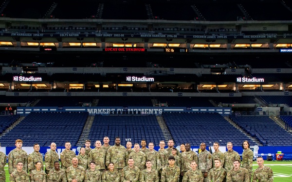 Indiana National Guard soldiers, airmen participate in pregame ceremonies at the Indianapolis Colts, Detroit Lions game