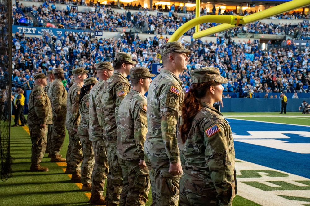 Indiana National Guard soldiers, airmen participate in pregame ceremonies at the Indianapolis Colts, Detroit Lions game