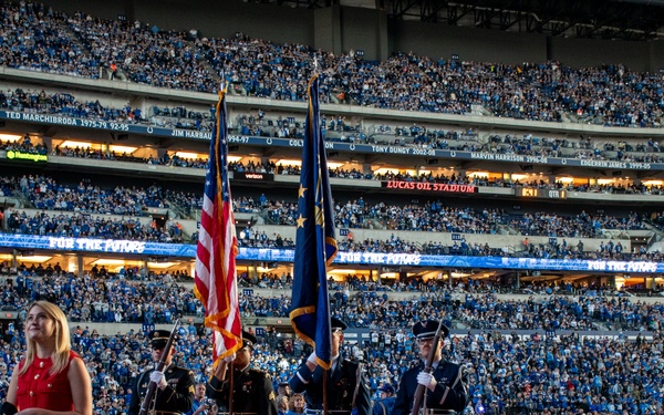 Indiana National Guard soldiers, airmen participate in pregame ceremonies at the Indianapolis Colts, Detroit Lions game