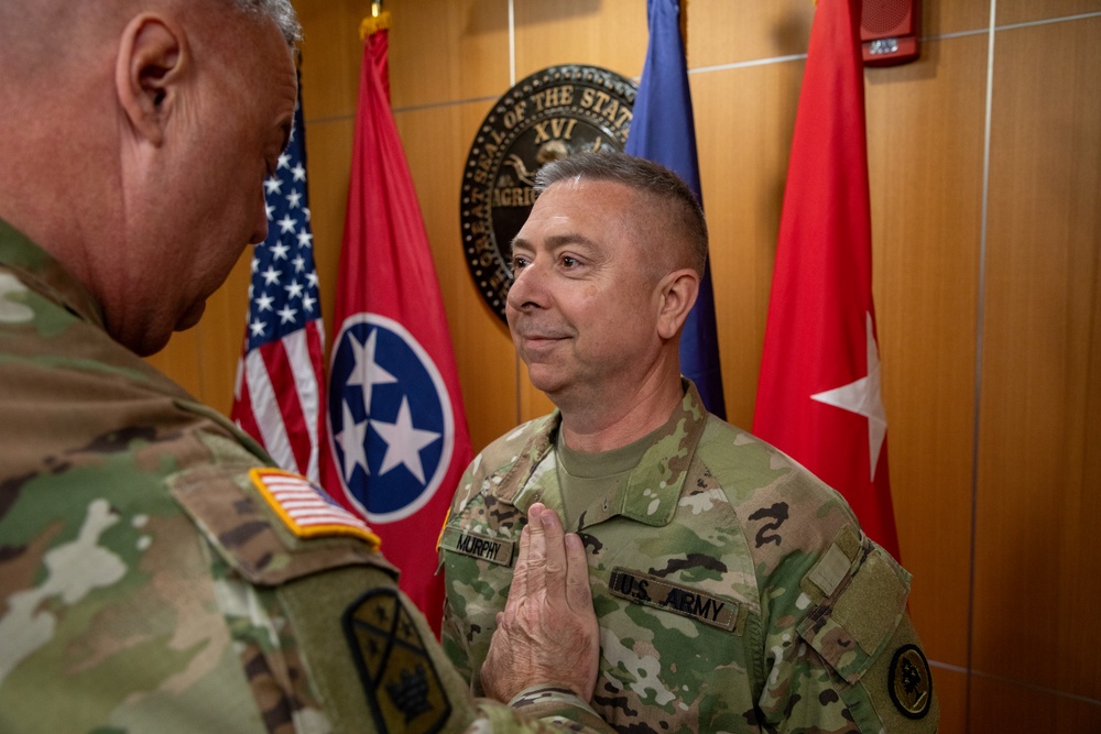 Promotion ceremony at Joint Force Headquarters for Major Gregg Murphy