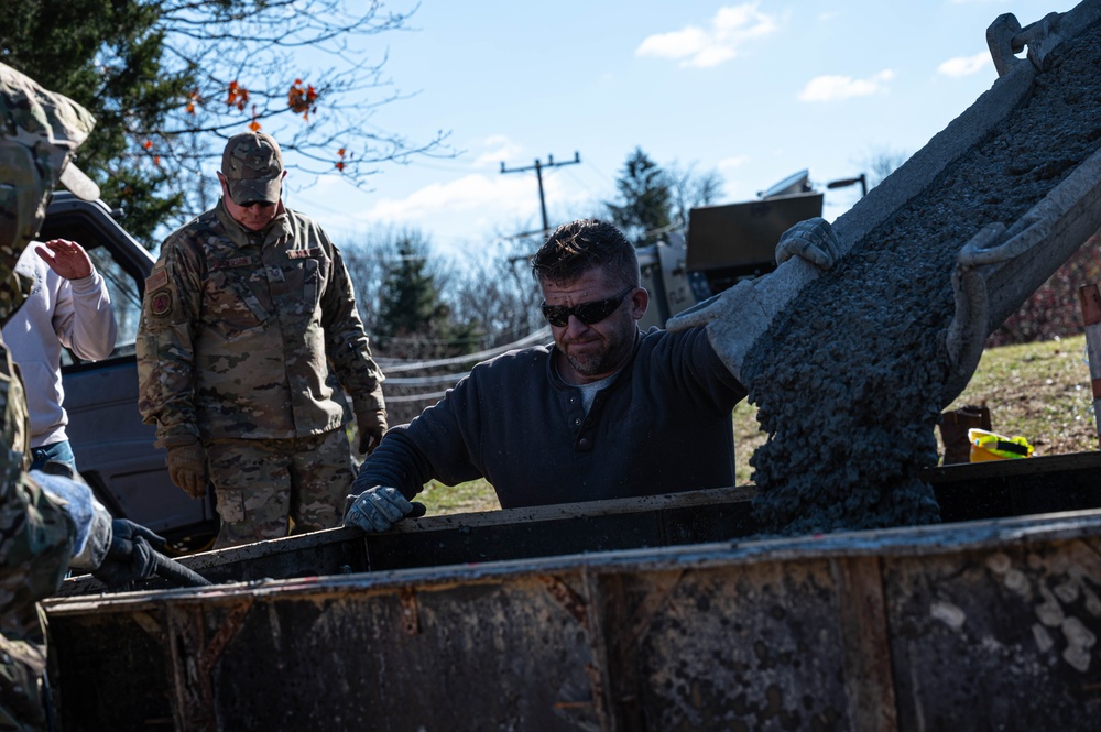 911th CES pours concrete for upcoming legacy monument