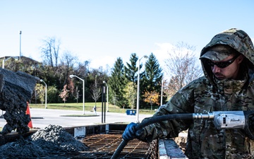 911th CES pours concrete for upcoming legacy monument