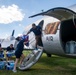 NAS Oceana Sailors help load hurricane relief supplies onto historic DC-3 with Military Aviation Museum