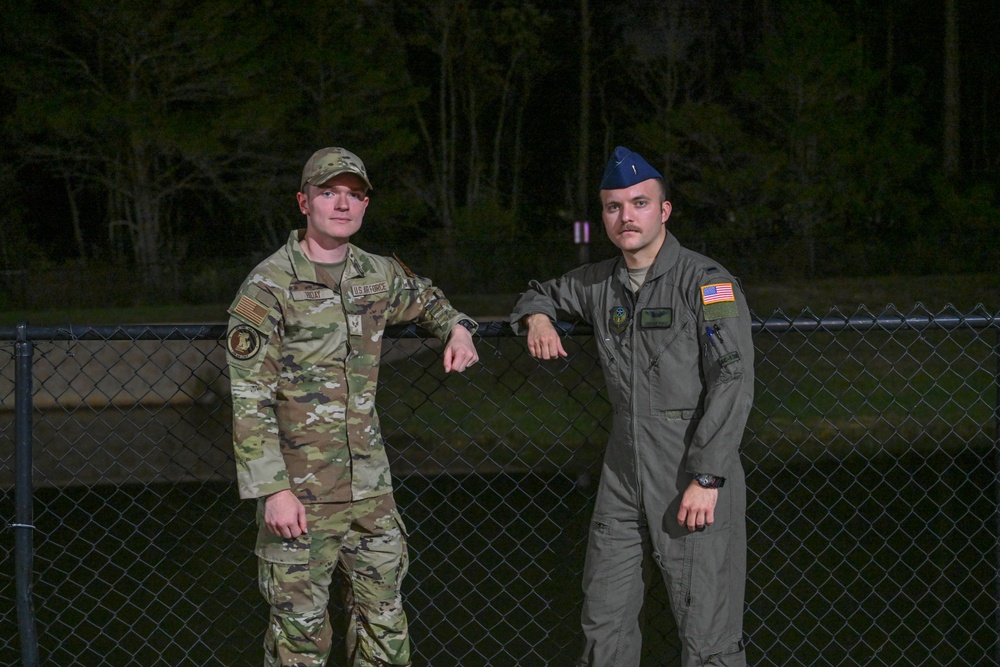 Airmen, civilians unite to save mother, son from submerged vehicle