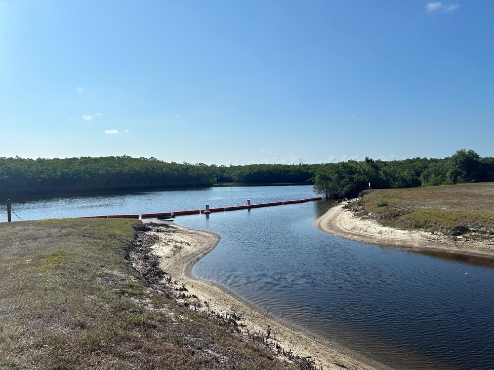 Downstream opening to Faka Union Canal that allows manatees to enter the Manatee Mitigation Feature under the boat barrier.