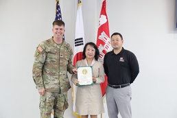Cheers to 45 Years: Song Mi receives length of service award for her remarkable commitment to U.S. Forces Korea