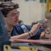 Aviation Structural Mechanic Files Launch Bar Placards in the Jet Shop Aboard USS Carl Vinson (CVN 70)