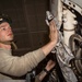 Aviation Machinist’s Mate Performs Preventative Maintenance on an E-2D Advance Hawkeye