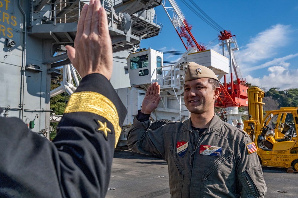 Commander, Task Force 70 (CTF 70) holds promotion ceremony