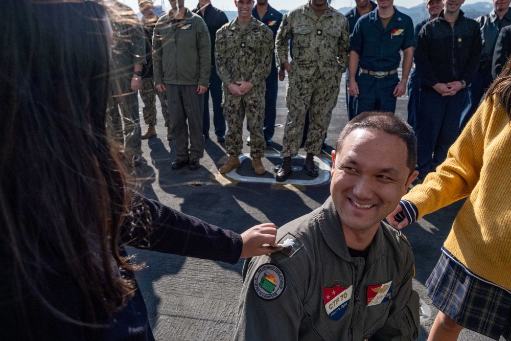 Commander, Task Force 70 (CTF 70) holds promotion ceremony