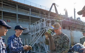 USS Emory S. Land Host Japan Maritime Self-Defense Force Sailors During Tour