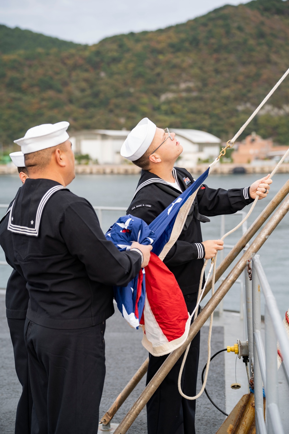 Emory S. Land Conducts Colors with Republic of Korea Navy Sailor