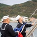 Emory S. Land Conducts Colors with Republic of Korea Navy Sailor