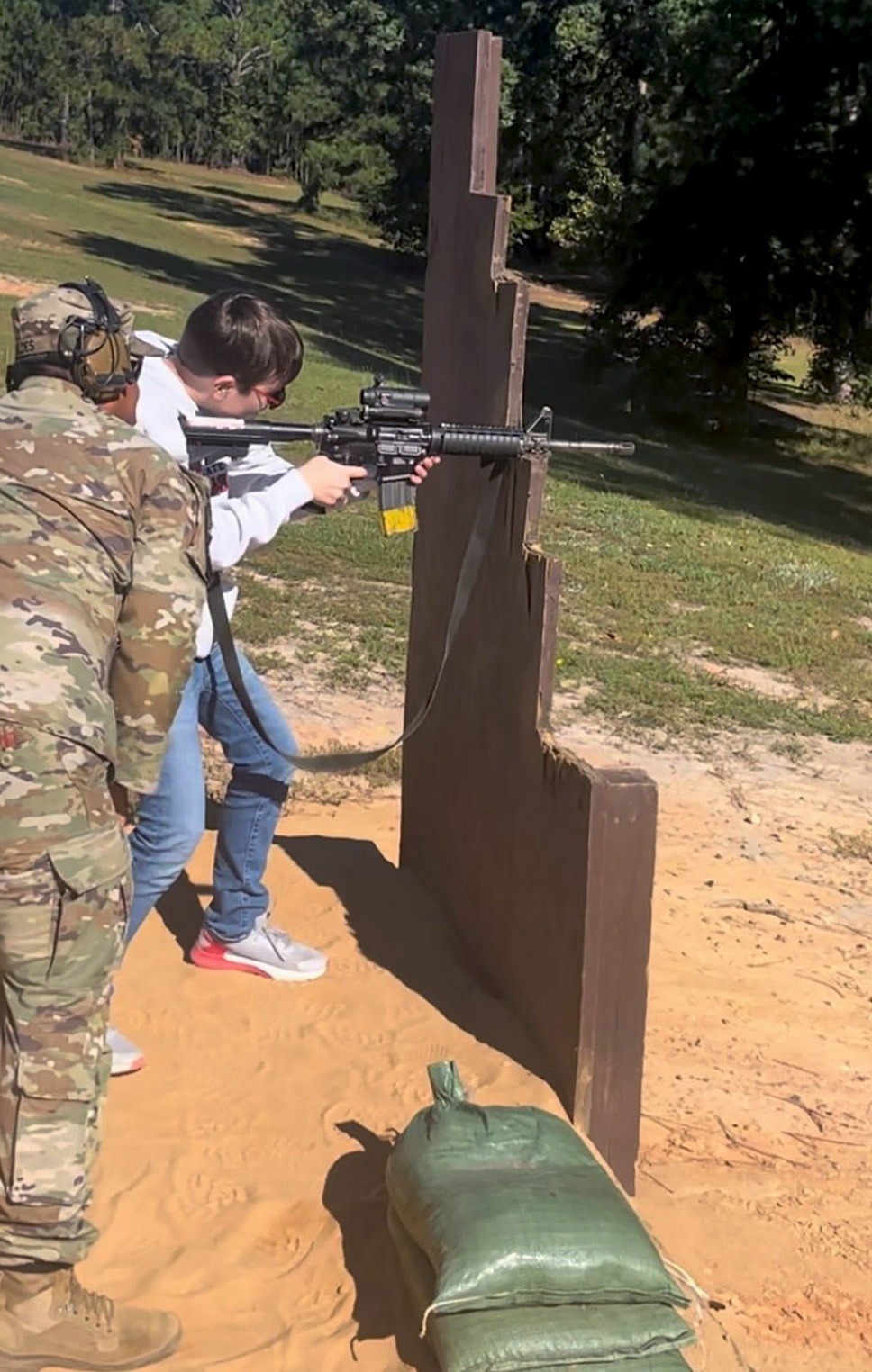 Colin Messenger shoots an M-4