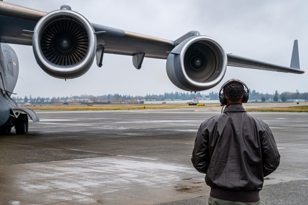 62d Airlift Wing Airmen set the stage for training flight