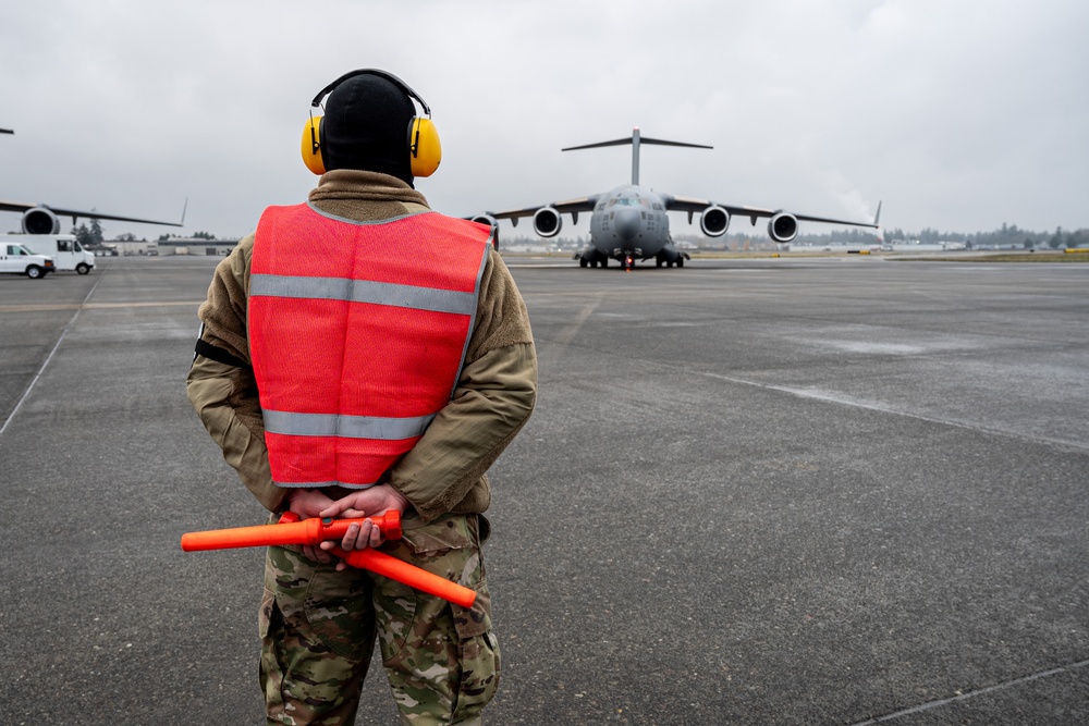 62d Airlift Wing Airmen set the stage for training flight