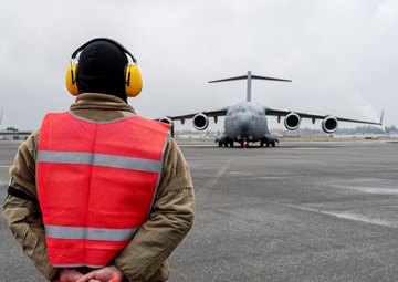 62d Airlift Wing Airmen set the stage for training flight