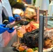 JBER Leaders serve Thanksgiving meals to service members